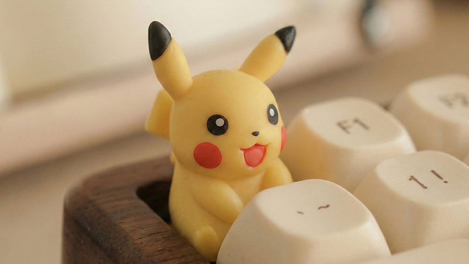 Close up of a 3D sculpted resin artisan keycap featuring a Pikachu design, highlighting layered resin depth, sculpted details, and handcrafted craftsmanship.